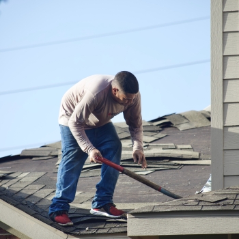 Man working on a roof